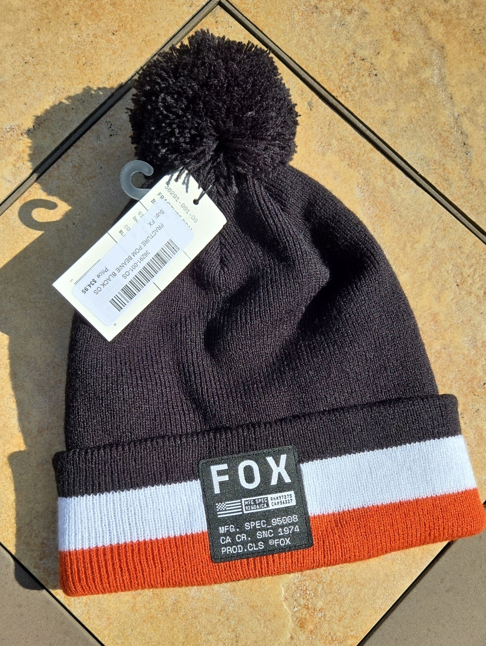NWT Fox Black Pom Beanie with White & Orange Stripe
